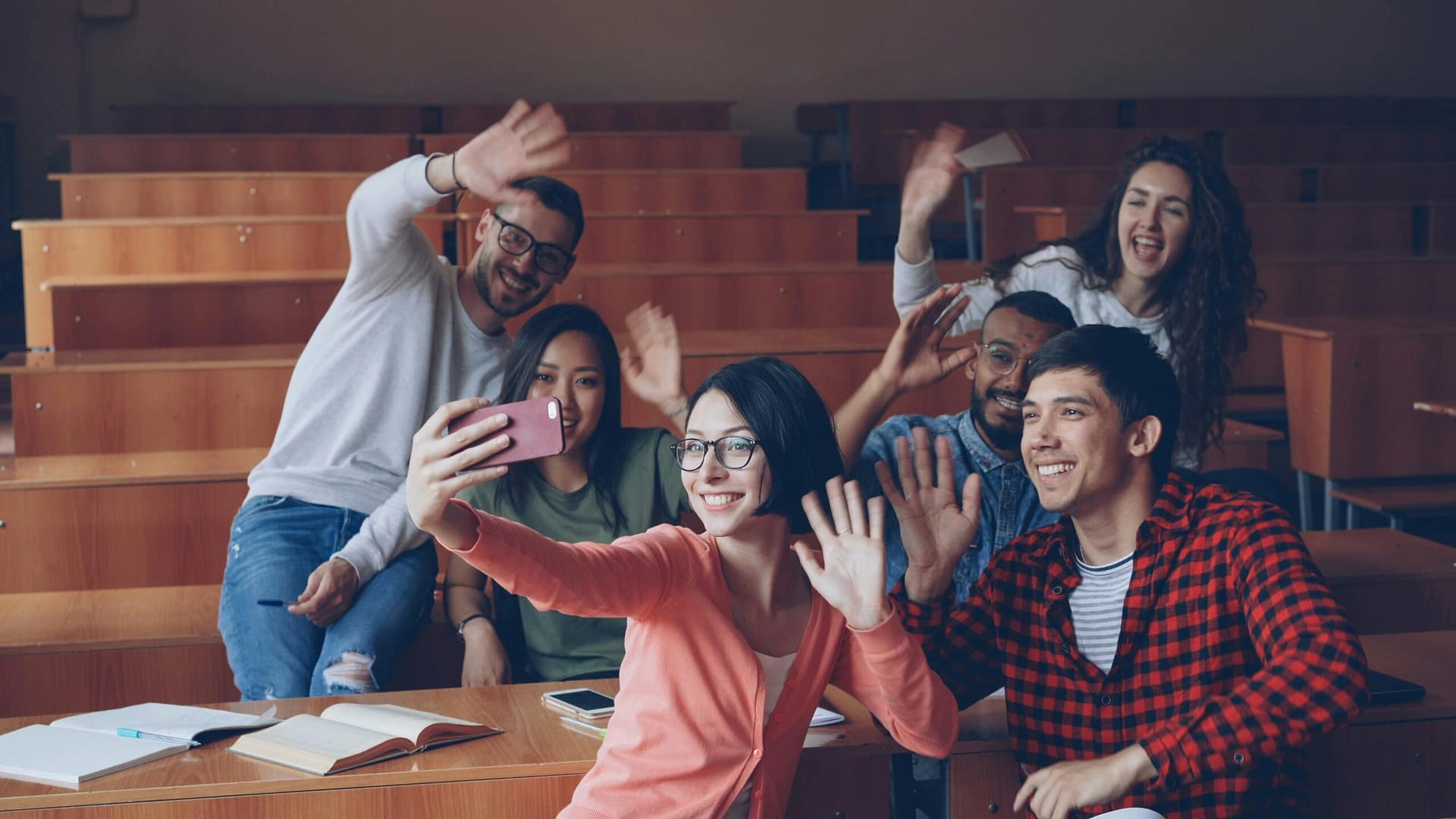 College students taking a selfie in a lecture hall — what happens to medical decisions when your child turns 18 in Indiana