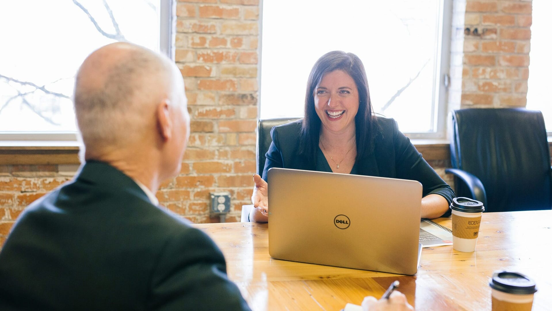 Estate planning attorney reviewing flat fee, hourly, and value-based pricing options with an Indiana client